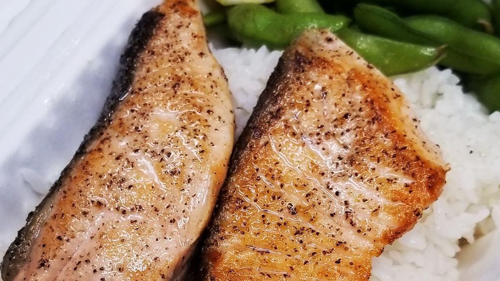 Pan Seared Salmon · Cooked. Sushi grade salmon, pan seared and served with rice, edamame, lemon wedge and house ponzu sauce.