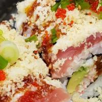 Laguna Cross Roll · Raw. Inside: spicy tuna, imitation crab, avocado. On top: ahi tuna, hamachi, fresh salmon, t...