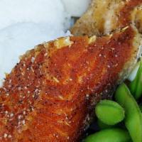 Salmon Kama · Cooked. Deep fried salmon collar served with rice, lemon wedge, ponzu sauce.  *Fish have bon...
