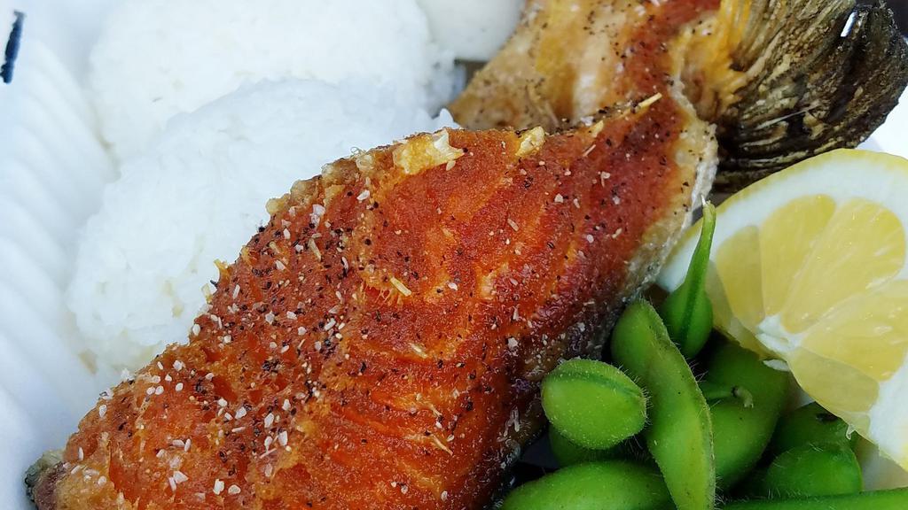 Salmon Kama · Cooked. Deep fried salmon collar served with rice, lemon wedge, ponzu sauce.  *Fish have bones*