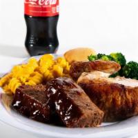Two Meat Combo · It’s time to meat your match. Choose two of our signature meats and add two regular sides an...