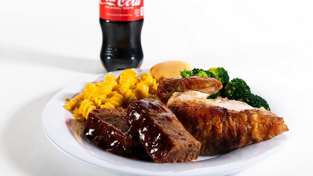 Two Meat Combo · It’s time to meat your match. Choose two of our signature meats and add two regular sides and cornbread for a combo you can’t beat. And go ahead, add a fountain drink on us.