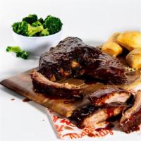 Baby Back Ribs · Family on the go? We think it’s time to take it slow. Slow-cooked and fall-off-the-bone-tend...