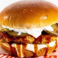 Nashville Hot Chicken Sandwich · Crispy Chicken Breast, topped with a smoky Nashville Hot sauce, pickles and Ranch dressing o...