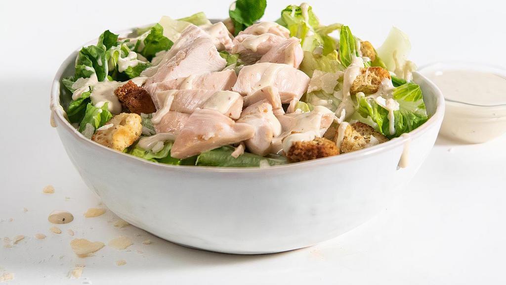 Caesar Salad · Sink your teeth into a total classic. We’ve blended together rotisserie chicken, romaine lettuce, croutons, and three kinds of cheese and topped it with classic Caesar dressing for the most scholarly salad you’ll ever enjoy.
