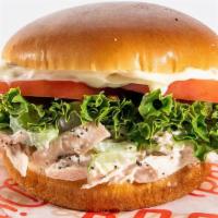 Chicken Salad Sandwich · Chicken salad, sliced tomato, lettuce and mayo on a brioche bun.