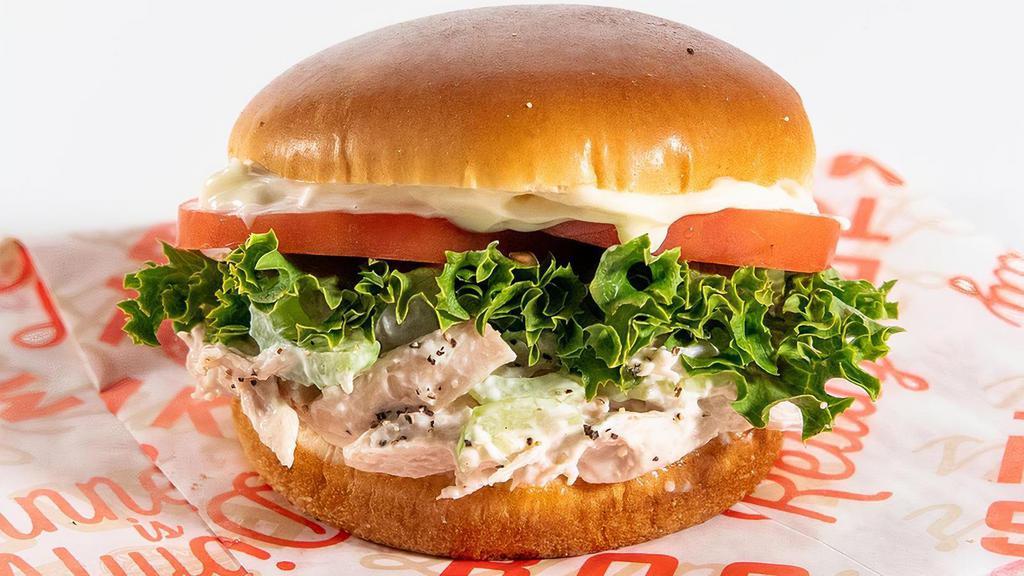 Chicken Salad Sandwich · Chicken salad, sliced tomato, lettuce and mayo on a brioche bun.