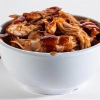Pulled Bbq Rotisserie Chicken · Hand-pulled rotisserie chicken tossed with our zesty BBQ sauce.