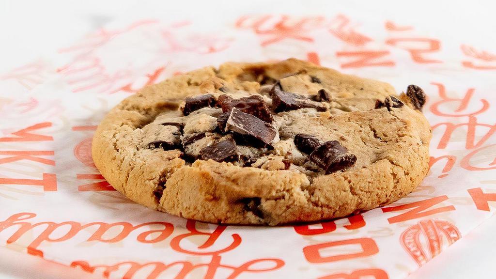 Decadent Triple Chocolate Chip Cookie · This cookie is made from David’s famous chocolate chunk cookie dough, generously topped with HERSHEY’S® MINI KISSES, semi-sweet chocolate chunks & milk chocolate chunks!