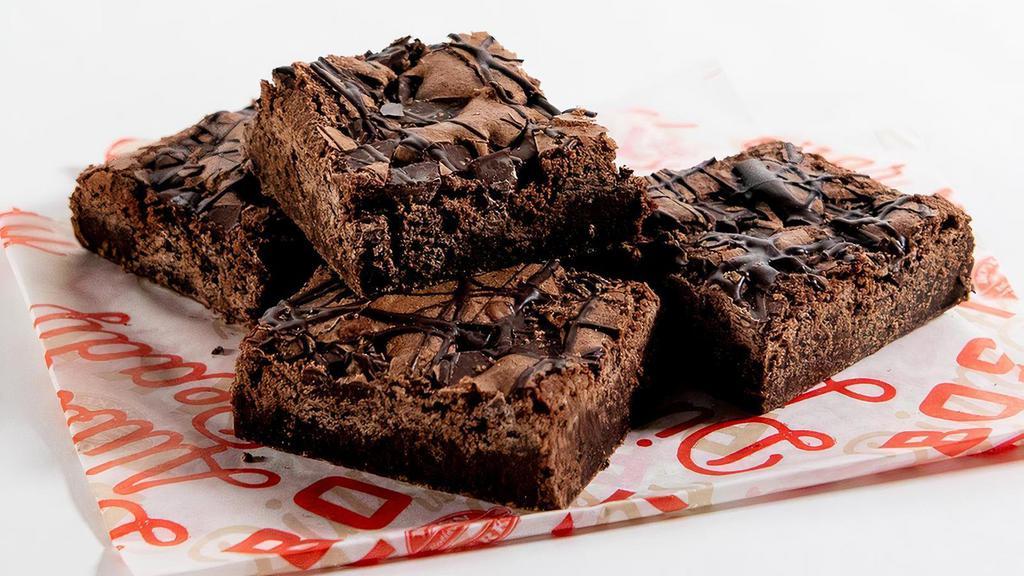 Indulgent Chocolate Brownie - Family Size · Traditional chocolate decadence  with chocolate chips bits throughout and striped on top.