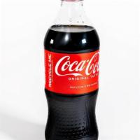 20Oz Bottled Beverage - Coke · 