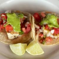 Grilled Fish · W/ Guacamole,cilantro,onios