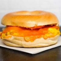 Bagel, Egg, & Cheddar Sandwich · 2 scrambled eggs, melted Cheddar cheese, and Sriracha aioli on a toasted bagel.