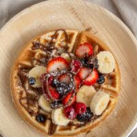 Nutella Waffles · Nutella and choice of topping ( strawberries, bananas, blueberries, or powdered sugar)