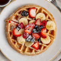 Waffles · Choice of topping: strawberries, bananas, Blueberries, or powdered sugar.