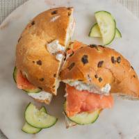 Smoked Salmon Bagel · Bagel, cucumber, cream cheese, smoked salmon, red onion.