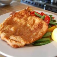 Chicken Milanese · Pan Fried Chicken Cutlet served with Grilled Lemon