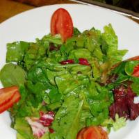 Rosti House Salad · Field Greens, Tomato, & Balsamic Vinaigrette