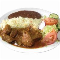 *Carne Guisada (Beef Roasted In Salsa) · Arroz, Frijoles, Ensalada y 2 Tortillas (Rice, Refried Beans, House Salad and 2 Handmade Tor...