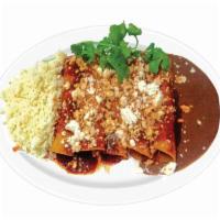 Enchiladas · An order of 4 enchiladas either chicken or cheese accompanied with a side of rice and beans.