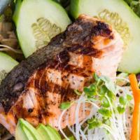 Grilled Salmon Salad · Grilled salmon, spring salad mix, avocado, cucumber, vinaigrette dressing