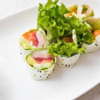 Ocean Roll · In: Tuna, Salmon, Yellowtail, Cucumber, Avocado, Lettuce Wrapped in soy paper