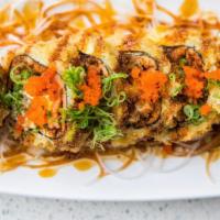 Crispy Roll · In: Spicy tuna, krab, cream cheese, jalapeno and avocado Top: Masago, green onion and eel sa...