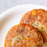 Aloo Tikki · Mashed Potatoes Spiced Up With Peas And Cheese.