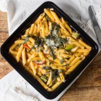 Sun-Dried Tomato Pasta · Penne with sun-dried tomatoes, corn, fresh tomatoes, asparagus, fresh basil in a light cream...