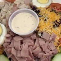 Chef'S Salad · Spring mix lettuce, American and Swiss cheese, turkey and ham, tomato, cucumber, boiled egg,...