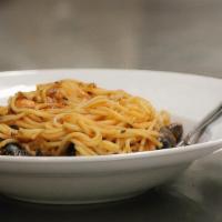 Frutti Di Mare · deliciously sauteed spaghetti with shrimp, clams, mussels, scallops, calamari and marinara