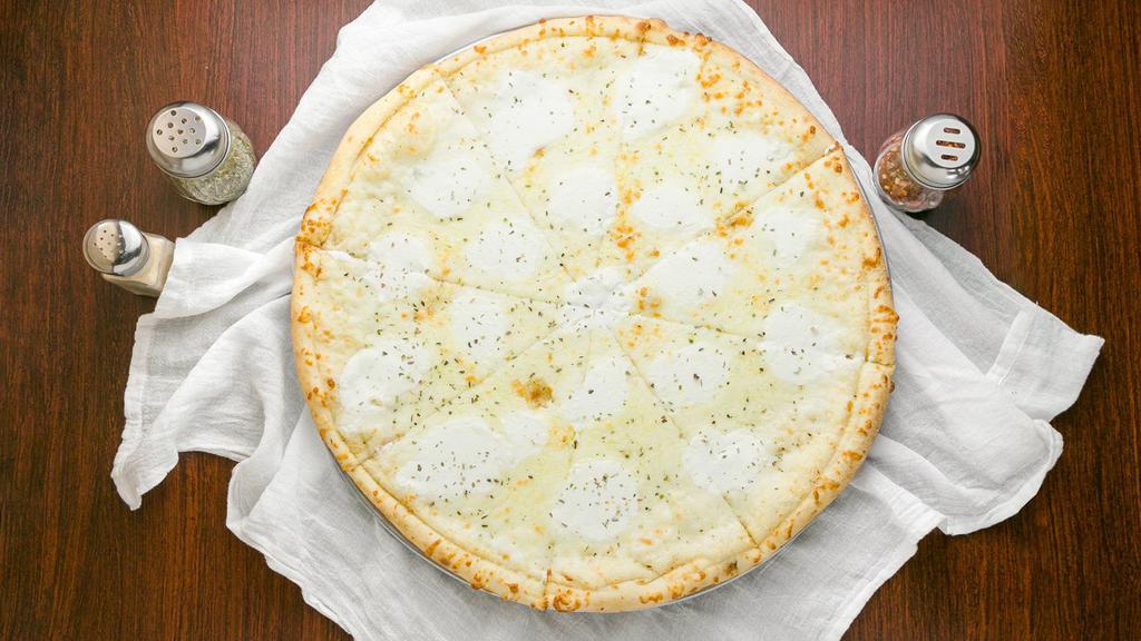 White Pizza · Ricotta, provolone, mozzarella, and parmesan cheeses with or without sun-dried tomatoes.
