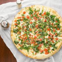 Margarita Pizza · Olive oil, hint of garlic, mozzarella cheese, Roma tomatoes, parmesan cheese, and fresh basil.