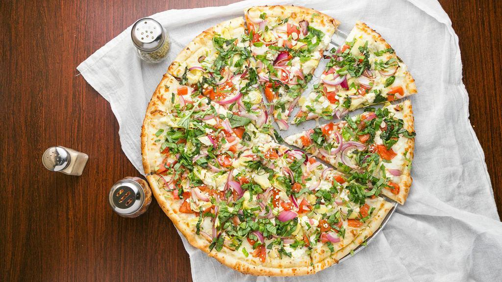 Greek Pizza · Olive oil, garlic, mozzarella, feta cheeses, red onions, roma tomatoes, parmesan cheese, oregano, and artichoke hearts.