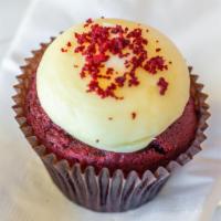 Famous Red Velvet Cupcake · Grandma's red velvet cake with our signature cream cheese frosting and red velvet crumbles.