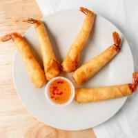 Shrimp Tempura · Deep fried shrimp lightly battered served with sweet sauce.