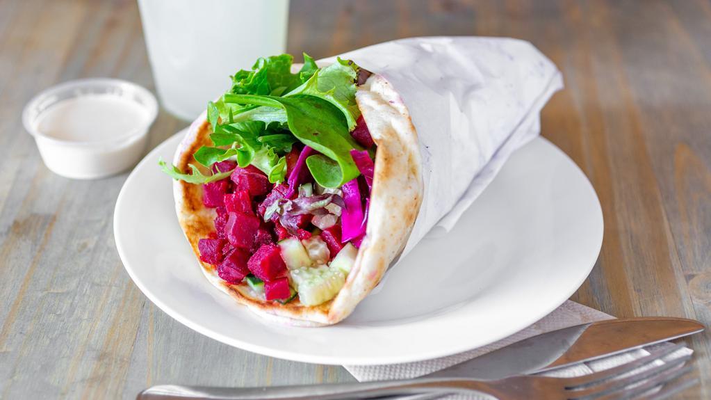 Lean On Me Pita · Fresh spinach leaves, mixed greens, cucumber, beets, red cabbage.
