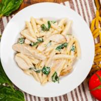 Chicken Spinach Penne Pasta · Juicy chicken breast with fresh spinach, tomato, garlic, extra virgin olive oil, basil and p...