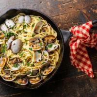 Spicy Clams And Linguini · Fresh clams with garlic, lemon, red chili flakes and extra virgin olive oil.