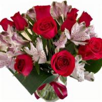 Rose Delight · Comes with Glass Vase
Flowers and/or Vase may slightly vary from picture, please add  specif...