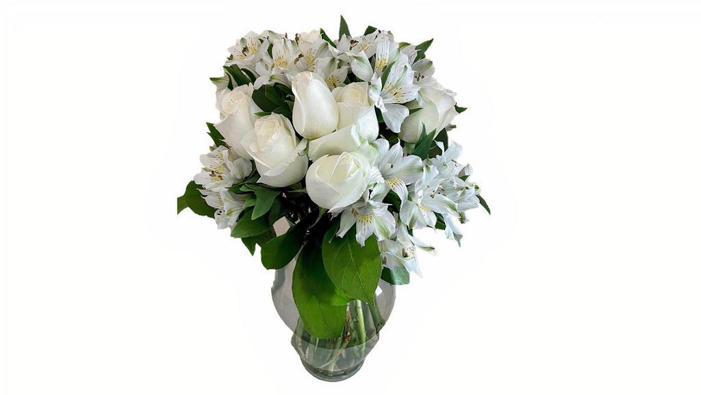 Bright Day · White Roses, Comes with Glass Vase
Flowers and/or Vase may slightly vary from picture, please add  specific requests into Special Instructions below