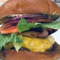 Classic Burger · Beef Burger, Bacon, Cheddar, Lettuce, Tomato, Onion, Pickle & Mayo on a Brioche Bun