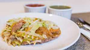 Chicken Tostada · Meat, beans, lettuce and cheese