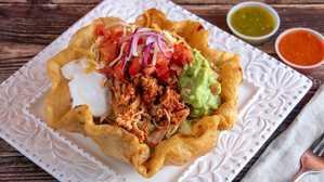 Taco Salad  Adobada · a deep fried flour tortilla with rice, beans, lettuce, choice of meat, pico de gallo, guacamole, sour cream and cheese