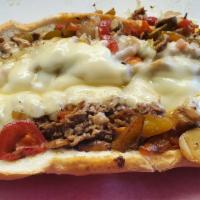 Superb Philly · Thinly sliced steak with caramelized onions, bell peppers, mushrooms, melted mozzarella chee...