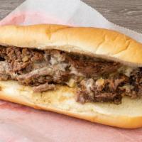 Original Philly · Thinly sliced steak with caramelized onions, melted mozzarella cheese, toasted on a philly r...