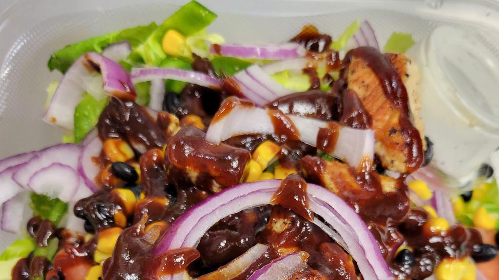 Bbq Chicken Salad · Romaine lettuce, chicken breast, bell peppers, onions, tomatoes, corn, and black beans. With ranch dressing.