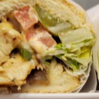 Stuffed Chicken Sandwich · Chicken breast, mushroom, onion, bell peppers, provolone cheese, lettuce, tomatoes, pickles ...