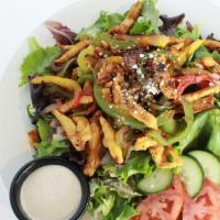 Chicken Fajita Salad · Grilled Chicken breast mixed with bell Peppers, Onions and Mushrooms over romaine Lettuce sp...