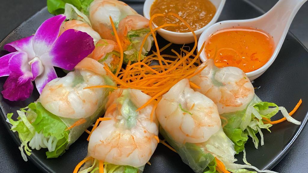 Fresh Spring Rolls · Organic tofu, carrots, cucumber, lettuce, cilantro and rice noodles wrapped in gluten free fresh rice paper. Served with spicy dipping sauce.